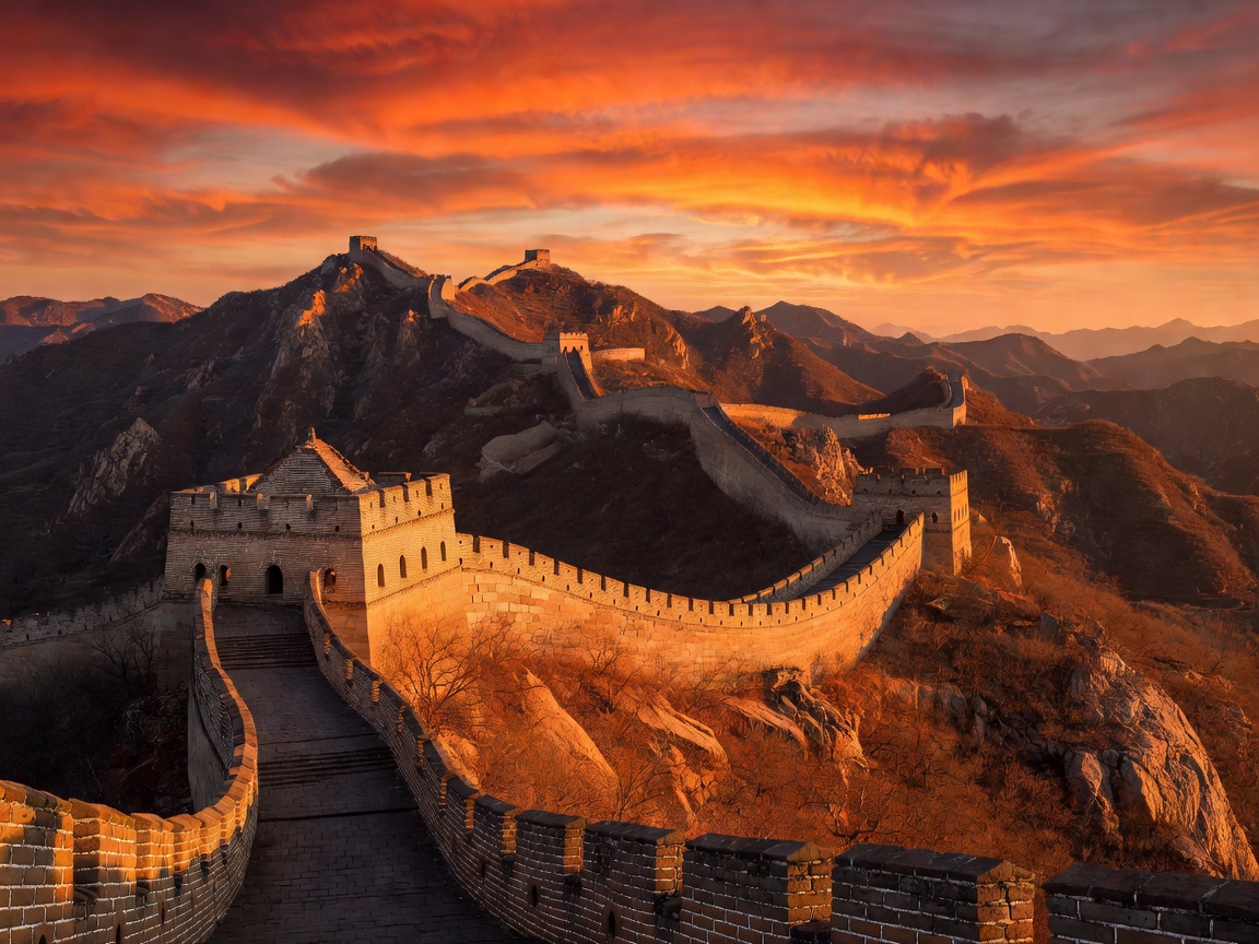 The Great Wall of China bathed in the glowing orange sunset light